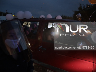 Ciudad Juarez High school students receive their diplomas inside their vehicles at a ''drive in'' graduation ceremony held at the Centro Cul...