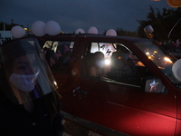 Ciudad Juarez High school students receive their diplomas inside their vehicles at a ''drive in'' graduation ceremony held at the Centro Cul...