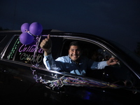 Ciudad Juarez High school students receive their diplomas inside their vehicles at a ''drive in'' graduation ceremony held at the Centro Cul...