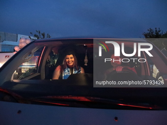 Ciudad Juarez High school students receive their diplomas inside their vehicles at a ''drive in'' graduation ceremony held at the Centro Cul...