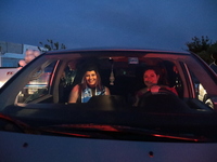 Ciudad Juarez High school students receive their diplomas inside their vehicles at a ''drive in'' graduation ceremony held at the Centro Cul...