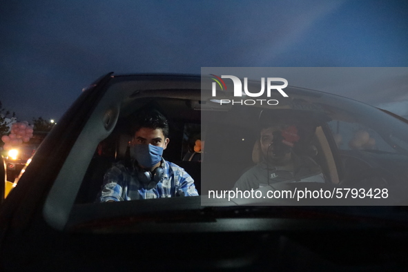 Ciudad Juarez High school students receive their diplomas inside their vehicles at a ''drive in'' graduation ceremony held at the Centro Cul...