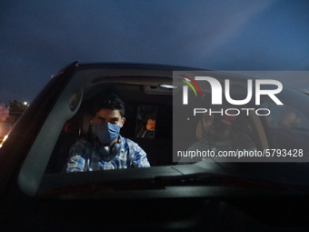 Ciudad Juarez High school students receive their diplomas inside their vehicles at a ''drive in'' graduation ceremony held at the Centro Cul...