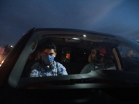 Ciudad Juarez High school students receive their diplomas inside their vehicles at a ''drive in'' graduation ceremony held at the Centro Cul...