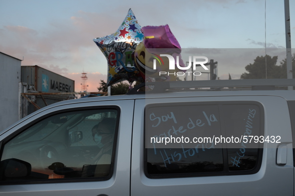 Ciudad Juarez High school students receive their diplomas inside their vehicles at a ''drive in'' graduation ceremony held at the Centro Cul...