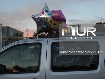 Ciudad Juarez High school students receive their diplomas inside their vehicles at a ''drive in'' graduation ceremony held at the Centro Cul...