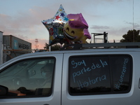 Ciudad Juarez High school students receive their diplomas inside their vehicles at a ''drive in'' graduation ceremony held at the Centro Cul...