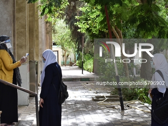 The start of the high school and Al-Azhar high school final exams, amid severe precautionary measures, sterilization, and temperature measur...