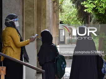 The start of the high school and Al-Azhar high school final exams, amid severe precautionary measures, sterilization, and temperature measur...