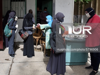 The start of the high school and Al-Azhar high school final exams, amid severe precautionary measures, sterilization, and temperature measur...