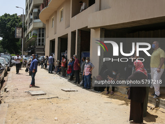 The parents waiting the students exit outside the examination committee during the first day of high school exams in Giza Governorate, Egypt...