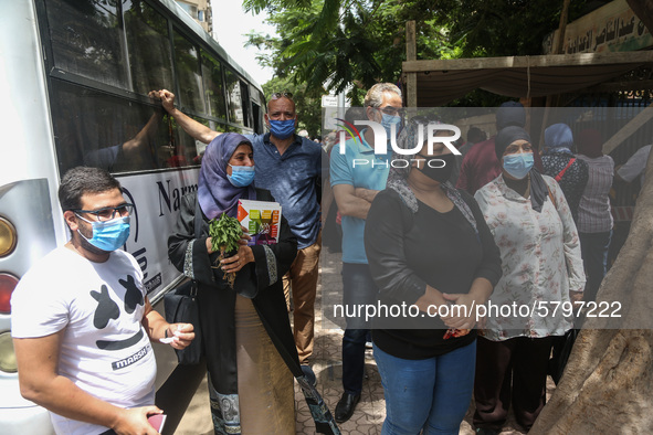 Hustle during the students ’exit from the Examination Committee during the first day of the high school exams in Giza Governorate, Egypt, on...