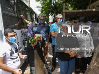 Hustle during the students ’exit from the Examination Committee during the first day of the high school exams in Giza Governorate, Egypt, on...