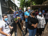 Hustle during the students ’exit from the Examination Committee during the first day of the high school exams in Giza Governorate, Egypt, on...