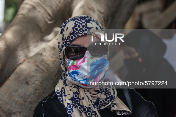 one of parents waiting the students exit outside the examination committee during the first day of high school exams in Giza Governorate, Eg...