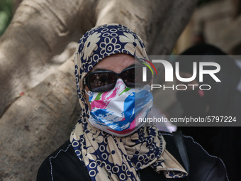 one of parents waiting the students exit outside the examination committee during the first day of high school exams in Giza Governorate, Eg...