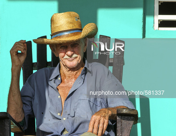 A farmer relaxes on his porch in Vinales, Cuba on May 7, 2015. Rocking chairs are a common site on the porches of most homes in Vinales. 

P...