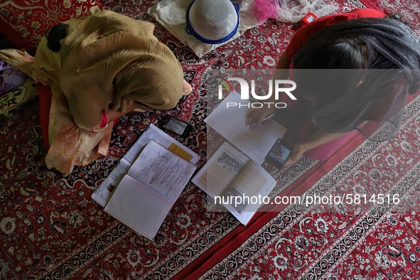 Kashmiri Students take Zoom Classes (online classes) at their home during Covid-19 (Coronavirus) lockdown in Sopore Town of district Baramul...