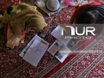 Kashmiri Students take Zoom Classes (online classes) at their home during Covid-19 (Coronavirus) lockdown in Sopore Town of district Baramul...