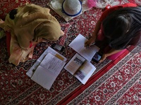 Kashmiri Students take Zoom Classes (online classes) at their home during Covid-19 (Coronavirus) lockdown in Sopore Town of district Baramul...