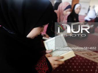 Girls attend a Koran memorization class as Palestinians ease the coronavirus disease (COVID-19) restrictions, in a mosque in Gaza City June...