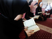 Girls attend a Koran memorization class as Palestinians ease the coronavirus disease (COVID-19) restrictions, in a mosque in Gaza City June...