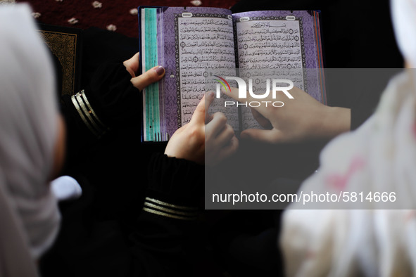 Girls attend a Koran memorization class as Palestinians ease the coronavirus disease (COVID-19) restrictions, in a mosque in Gaza City June...