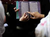 Girls attend a Koran memorization class as Palestinians ease the coronavirus disease (COVID-19) restrictions, in a mosque in Gaza City June...