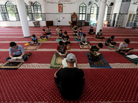  Boys keeping a safe distance from each other,attend a Koran memorization class as Palestinians ease the coronavirus disease (COVID-19) rest...