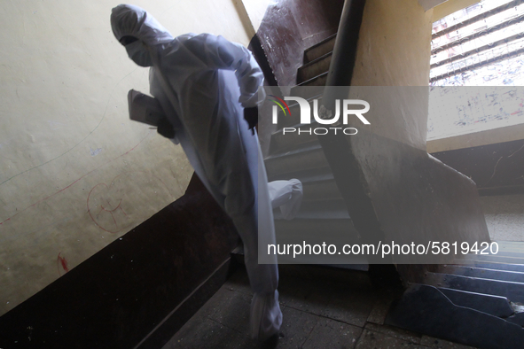 A healthcare worker walks down the stairs during a medical check-up in Mumbai, India on July 01, 2020. India is the fourth worst-hit nation...