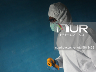 A healthcare worker waits to conduct a medical check-up in Mumbai, India on July 01, 2020. India is the fourth worst-hit nation by the Coron...