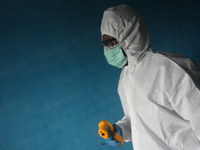 A healthcare worker waits to conduct a medical check-up in Mumbai, India on July 01, 2020. India is the fourth worst-hit nation by the Coron...