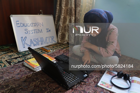 A Student self studies at her home during Covid-19 (coronavirus) pandemic in Sopore Town of District Baramulla Jammu and Kashmir,  India on...