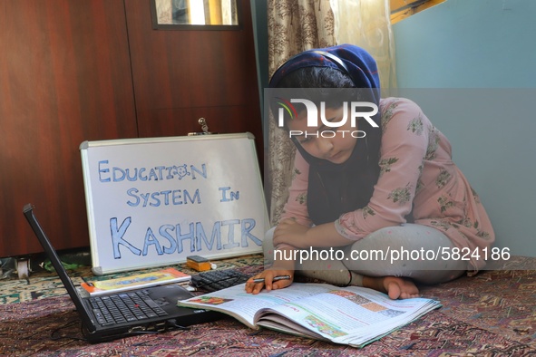 A Student self studies at her home during Covid-19 (coronavirus) pandemic in Sopore Town of District Baramulla Jammu and Kashmir,  India on...