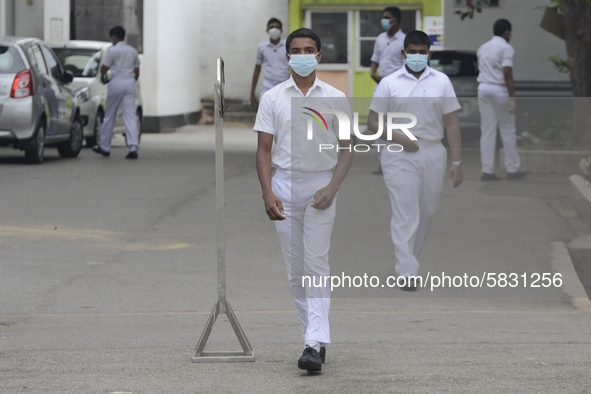 Student wearing facemask walk along in school in Colombo, Sri Lanka July 7, 2020
Sri Lankan Government announced the reopening of school fo...