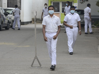 Student wearing facemask walk along in school in Colombo, Sri Lanka July 7, 2020
Sri Lankan Government announced the reopening of school fo...