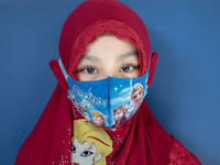 Portrait of a little girl participant of school test selection at Depok, West Java, Indonesia, on July 6, 2020.  The Education and Culture M...