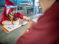 A little girl during her test for school selection test at Depok, West Java, Indonesia, on July 6, 2020.  The Education and Culture Ministry...