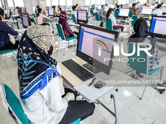 Participants waiting for the test to begin at a campus in the National State University selection test in Depok, West Java, Indonesia, on Ju...