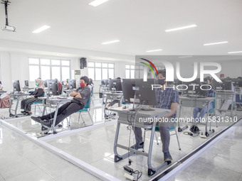 Participants waiting for the test to begin at a campus in the National State University selection test in Depok, West Java, Indonesia, on Ju...