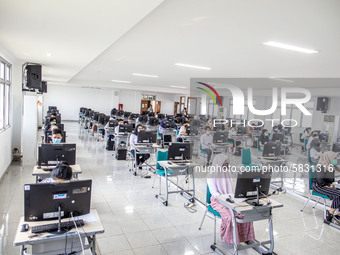 Participants waiting for the test to begin at a campus in the National State University selection test in Depok, West Java, Indonesia, on Ju...