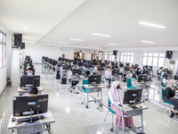 Participants waiting for the test to begin at a campus in the National State University selection test in Depok, West Java, Indonesia, on Ju...