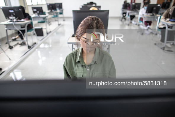 A beautiful participant waiting for the examination at a campus for State University selection in Depok, West Java, Indonesia, on July 6, 20...