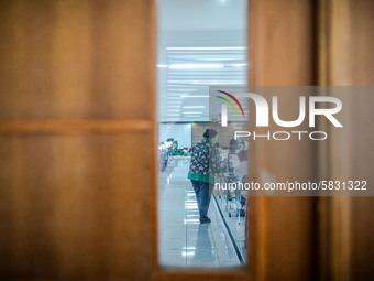 A supervisor of  State University selection at a campus in Depok-West Java checking the readiness of participant in Depok, West Java, Indone...