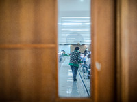 A supervisor of  State University selection at a campus in Depok-West Java checking the readiness of participant in Depok, West Java, Indone...