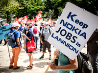 Several hundred employees of the Nokia group, including those at the Lannion plant, gathered in Paris, France, on July 8, 2020 for a large d...