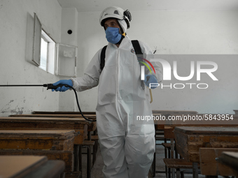 Members of civil defense known as white helmets sterilize school classes after discovering 3 COVID-19 cases in Idlib, Syria on July 11, 2020...