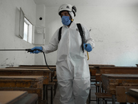 Members of civil defense known as white helmets sterilize school classes after discovering 3 COVID-19 cases in Idlib, Syria on July 11, 2020...