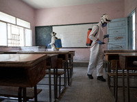 Members of civil defense known as white helmets sterilize school classes after discovering 3 COVID-19 cases in Idlib, Syria on July 11, 2020...