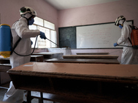 Members of civil defense known as white helmets sterilize school classes after discovering 3 COVID-19 cases in Idlib, Syria on July 11, 2020...